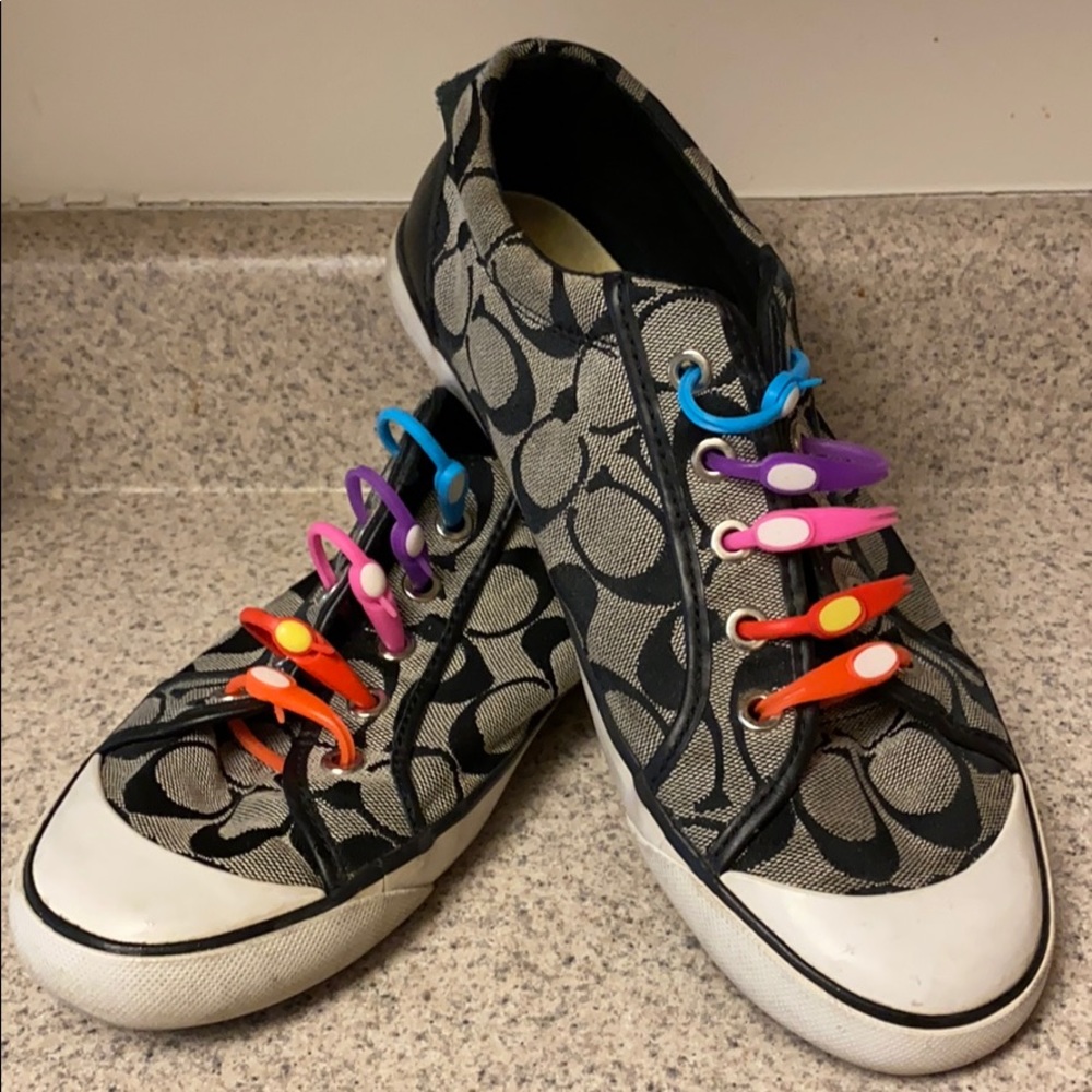 Coach black and gray shoes.